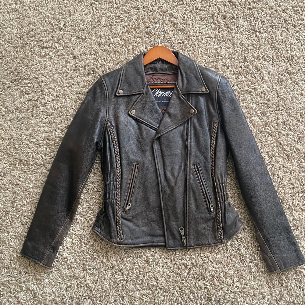 Genuine dark brown leather jacket with braided detailing.